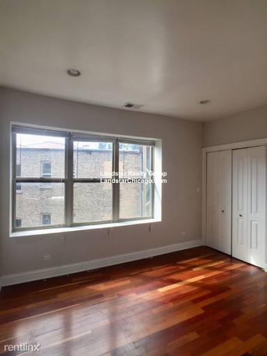 Main picture of 2038-48 W Touhy Ave & 7213-29 N Rogers Ave