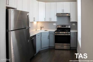 Main picture of 1507-11 W Barry Ave & 3052-58 N Greenview Ave