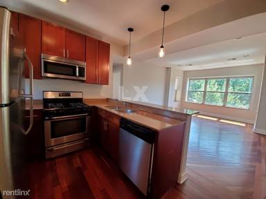 Main picture of 2038-48 W Touhy Ave & 7213-29 N Rogers Ave