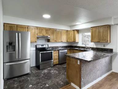 Main picture of 6624 E 6th Ave