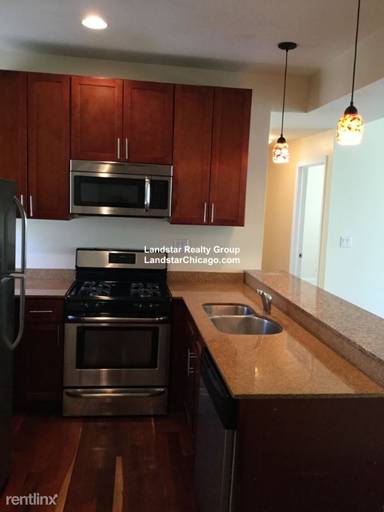 Main picture of 2038-48 W Touhy Ave & 7213-29 N Rogers Ave