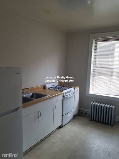 Main picture of 4101-09 N Kedzie Ave & 3154-56 W Belle Plaine Ave