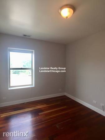 Main picture of 2038-48 W Touhy Ave & 7213-29 N Rogers Ave