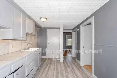 Main picture of 3223-3225 E 8th St. - 2W