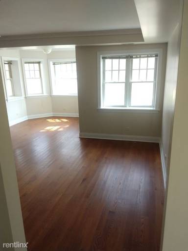 Main picture of 2702 W Ainslie St & 4906 N Washtenaw Ave Apartments