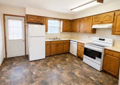 Main picture of 210 E 3rd St