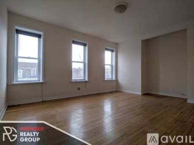 Main picture of 3034-48 W Wellington Ave & 3000-08 N Whipple St