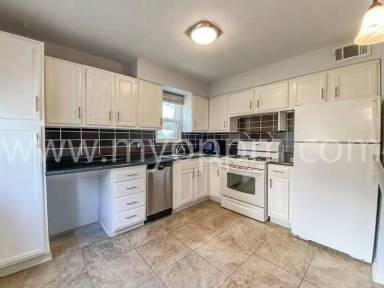 Main picture of 5011 Poppleton Ave