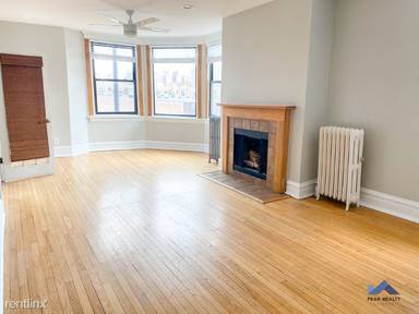 Main picture of 810 W Newport Ave & 3438 N Halsted St Apartments