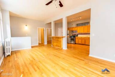 Main picture of 810 W Newport Ave & 3438 N Halsted St Apartments