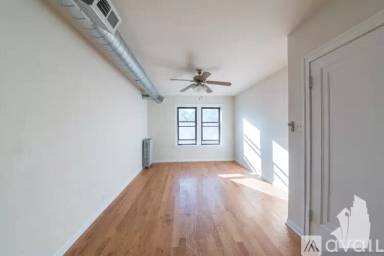 Main picture of 1249-55 W Henderson St & 3323-25 N Lakewood Ave