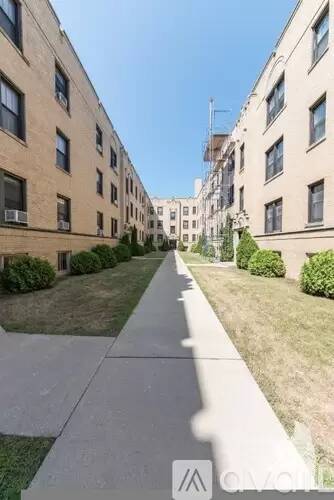 Main picture of 1940-54 W Wilson Ave & 4600-14 N Winchester Ave