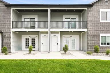 Main picture of Welcome home to this beautifully designed 3-bedroom, 2-bathroom new construction townhome in one of Logan's most desirable neighborhoods.