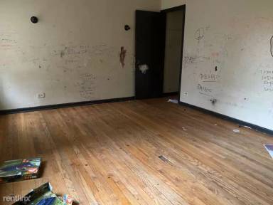 Main picture of 8231-8237 S Ingleside Ave Apartments