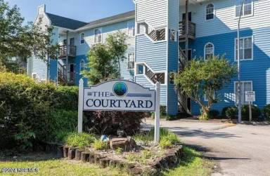 Main picture of First floor condo with community pool!