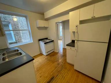 Main picture of 3034-48 W Wellington Ave & 3000-08 N Whipple St