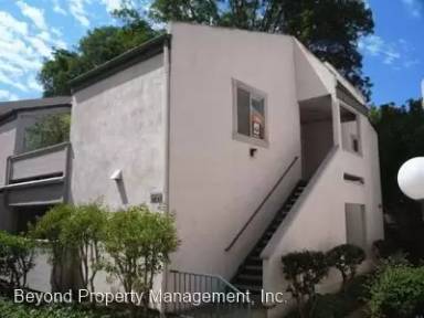 Main picture of The Village Woods Condominium Complex