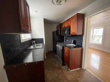 Main picture of 6301-05 N Washtenaw Ave & 2650-52 Ave