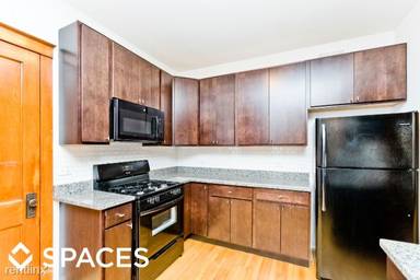 Main picture of 2121-2125 W. Irving Park / 3945-53 N. Hamilton