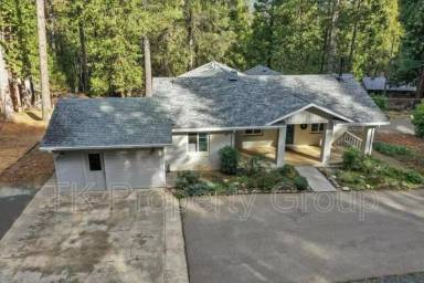 Main picture of 301 Woodpecker Ln