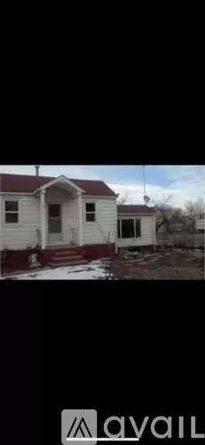 Main picture of 1211 E 62nd Ave
