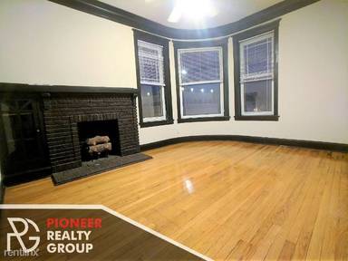 Main picture of 1507-11 W Barry Ave & 3052-58 N Greenview Ave