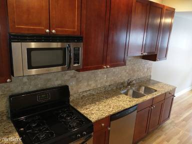 Main picture of 1348 1/2 W Estes Ave