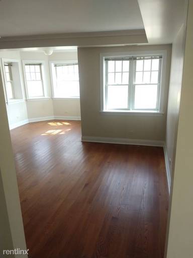 Main picture of 2702 W Ainslie St & 4906 N Washtenaw Ave Apartments