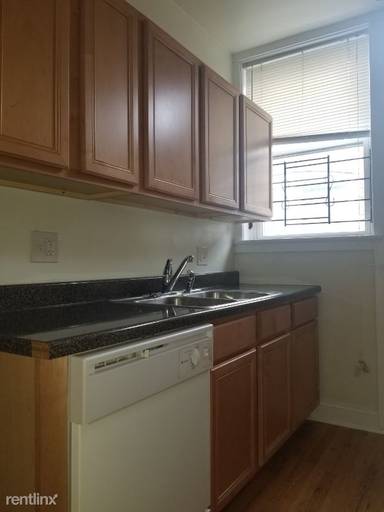 Main picture of 3601-05 N. Janssen Ave 1420-24 W. Addison St