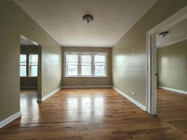 Main picture of 1549-53 N Waller Ave & 5655-59 W North Ave Apartments