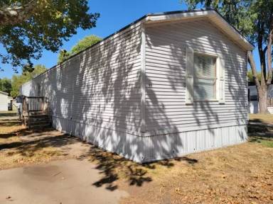 Main picture of The Woodlands Manufactured Home Community