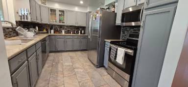 Main picture of 6345 W 62nd Ave