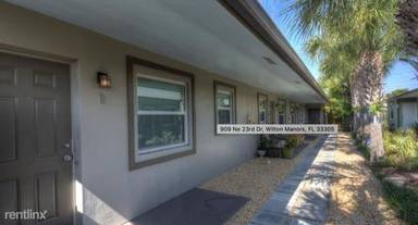 Main picture of 909 NE 23rd Dr