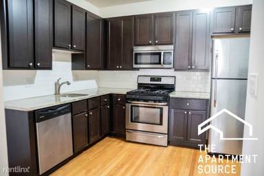 Main picture of 2035-37 W Arthur Avenue 6446-56 Seeley Ave