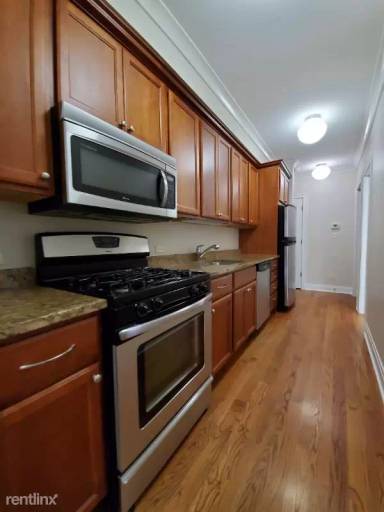 Main picture of 2702 W Ainslie St & 4906 N Washtenaw Ave Apartments