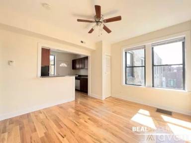 Main picture of 1444 W Byron St & 3900-04 N Janssen Ave