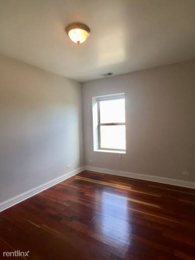 Main picture of 2038-48 W Touhy Ave & 7213-29 N Rogers Ave