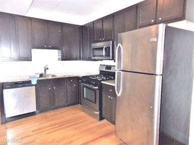 Main picture of 2035-37 W Arthur Avenue 6446-56 Seeley Ave