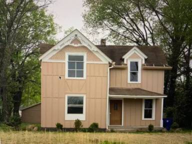 Main picture of 606 E 3rd Ave