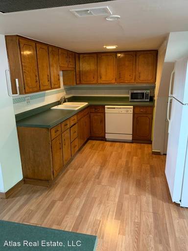 Main picture of 1201 E 62nd Ave