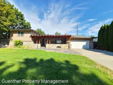 Main picture of 1607 E 58th Ave
