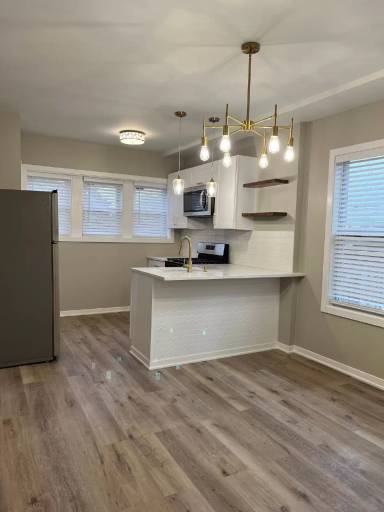 Main picture of 5327 S Nashville Ave