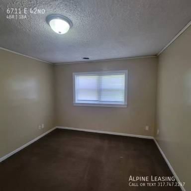 Main picture of 6711 E 42nd St