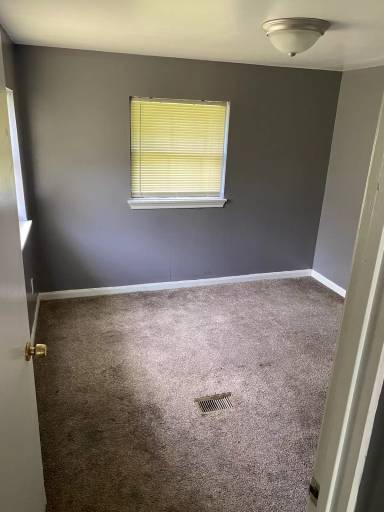 Main picture of 303 E Shawntel Smith Blvd