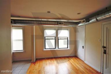 Main picture of 1249-55 W Henderson St & 3323-25 N Lakewood Ave