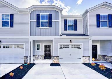 Main picture of 303 Windsinger Ln