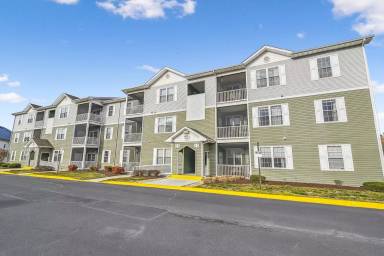Main picture of Enjoy coastal living in this Rehoboth Beach apartment, perfectly situated near the boardwalk, beaches, dining, and entertainment.