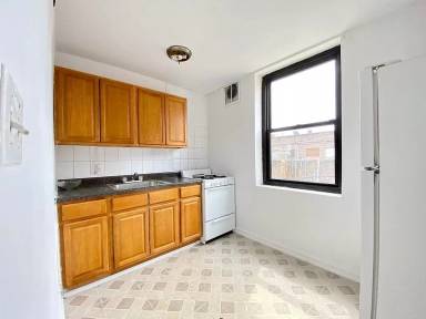 Main picture of 8615 Dongan Ave