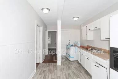 Main picture of 3223-3225 E 8th St. - 2W