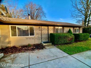 Main picture of 910 NE Village Squire Ave